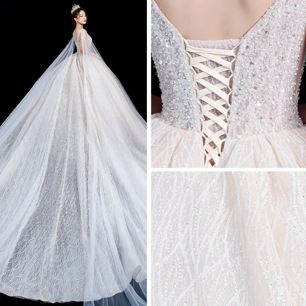 High-end Champagne Wedding Dresses 2020 Ball Gown Deep V-Neck Sleeveless Backless Appliques Lace Sequins Beading Watteau Train Ruffle