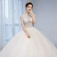 Charmant Champagner Durchsichtige Brautkleider / Hochzeitskleider 2020 Ballkleid Rundhalsausschnitt Ärmel Rückenfreies Perlenstickerei Glanz Tülle Kapelle-Schleppe Rüschen