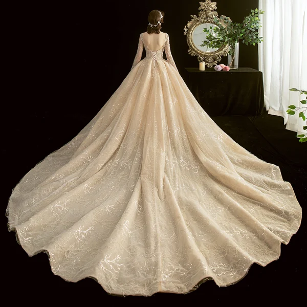 Schöne Champagner Durchsichtige Brautkleider / Hochzeitskleider 2020 Ballkleid Eckiger Ausschnitt Lange Ärmel Rückenfreies Glanz Tülle Applikationen Spitze Perlenstickerei Kathedrale Schleppe Rüschen