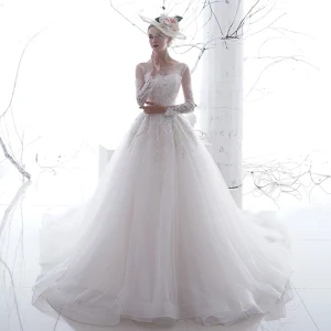 Chic Belle Blanche Transparentes Robe De Mariée 2020 Princesse Encolure Dégagée Manches Longues Dos Nu Appliques En Dentelle Chapel Train Volants