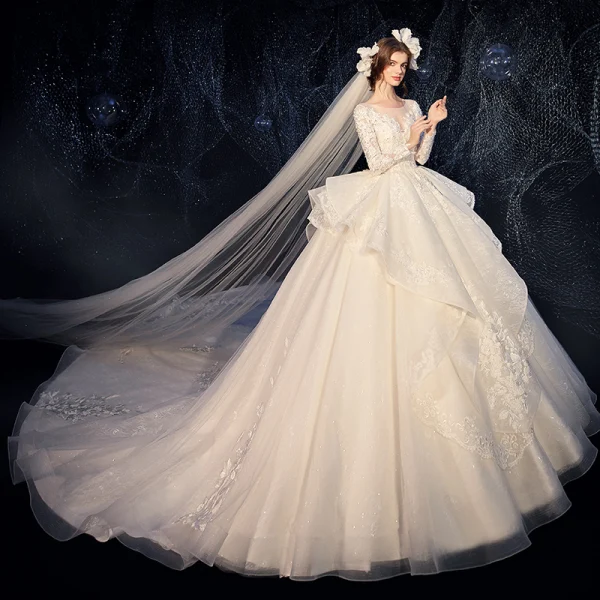 Charming Champagne See-through Wedding Dresses 2020 Ball Gown Scoop Neck Sleeveless Backless Pierced Appliques Lace Beading Glitter Tulle Cathedral Train Ruffle