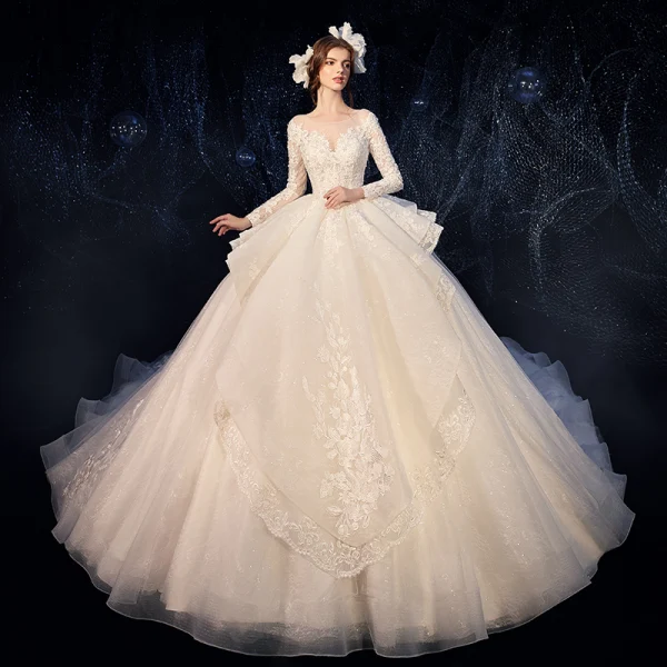 Charming Champagne See-through Wedding Dresses 2020 Ball Gown Scoop Neck Sleeveless Backless Pierced Appliques Lace Beading Glitter Tulle Cathedral Train Ruffle