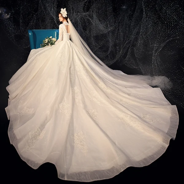 Chic / Beautiful Champagne Wedding Dresses 2020 Ball Gown Deep V-Neck Long Sleeve Backless Glitter Tulle Pierced Appliques Lace Beading Pearl Cathedral Train Ruffle