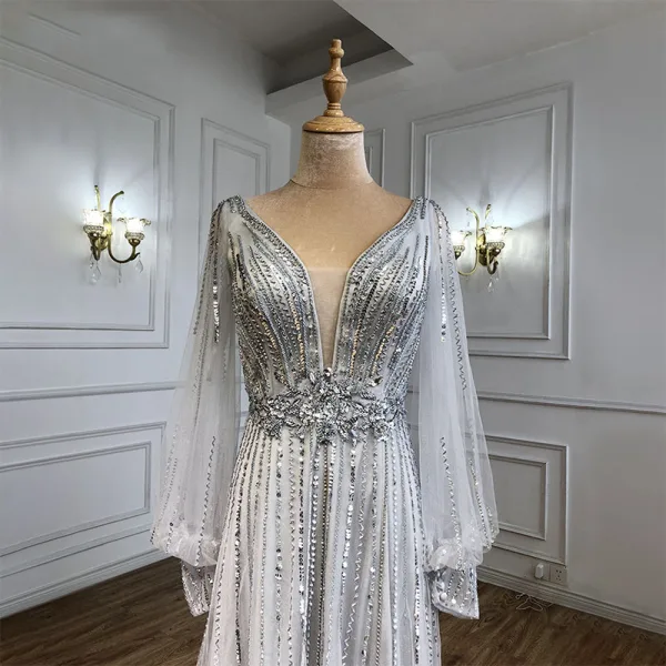 Charmant High End Beige Abendkleider 2021 A Linie V-Ausschnitt Perlenstickerei Strass Pailletten Lange Ärmel Rückenfreies Sweep / Pinsel Zug Abend Festliche Kleider