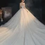 Slående Stjerne Korsett Champagne Ballkjole Bryllups Sommer Brudekjoler 2020 Med Kappe Rhinestone Perle Kjæreste Tyll Kryssede Stropper Chapel Train Uten Ermer