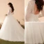 Élégant Ivoire Robe De Mariée 2018 Robe Boule Dentelle Encolure Dégagée Dos Nu Manches Longues Chapel Train Mariage