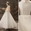 Élégant Couleur Unie Ivoire Robe De Mariée 2019 Princesse Encolure Dégagée Sans Manches En Dentelle Longue