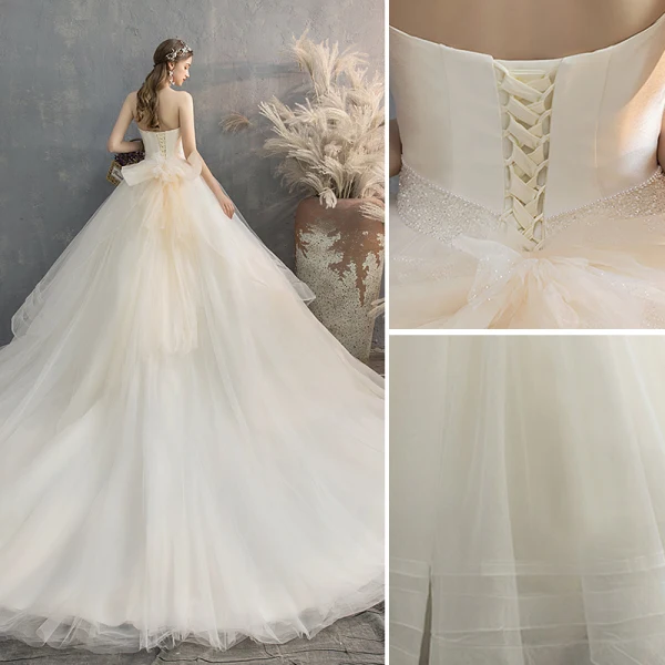 Charmant Champagne Robe De Mariée 2019 Princesse Bustier Noeud Sans Manches Dos Nu Cathedral Train