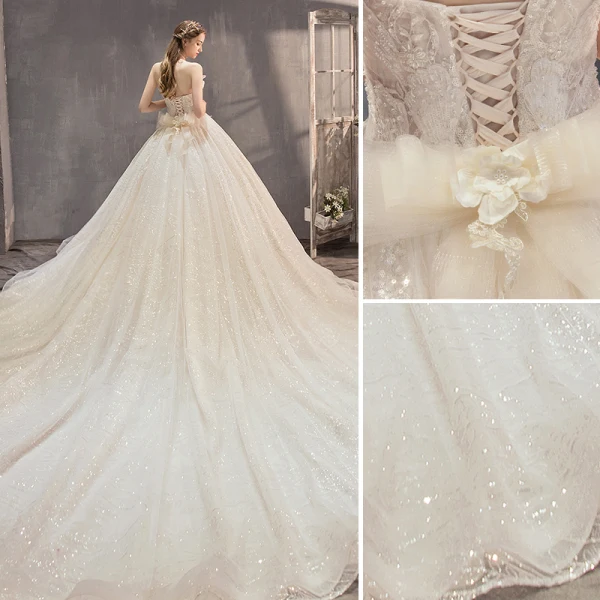 Fabuleux Champagne Robe De Mariée 2019 Princesse Bustier Perlage Paillettes Sans Manches Dos Nu Appliques Noeud Royal Train