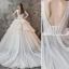 Charming Champagne Wedding Dresses 2019 Ball Gown V-Neck Pearl Sleeveless Backless Cascading Ruffles Cathedral Train