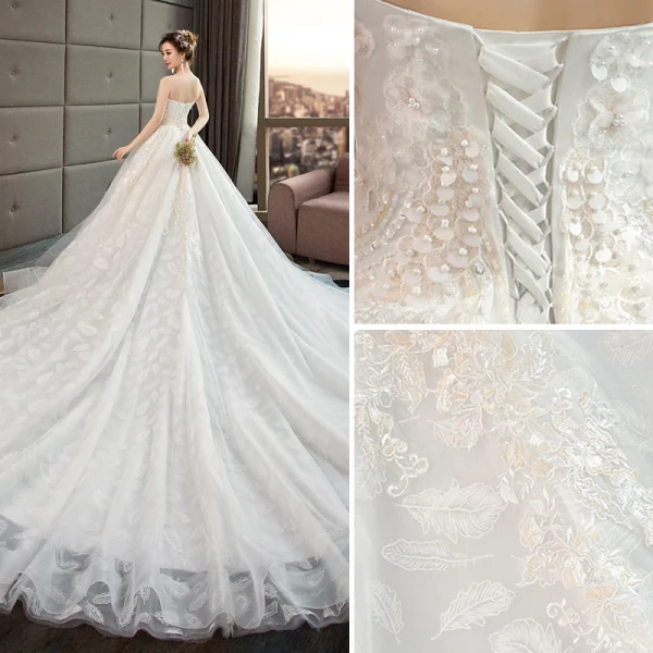 Edles Ivory / Creme Brautkleider / Hochzeitskleider 2019 A Linie Perlenstickerei Perle Pailletten Spitze Blumen Ärmellos Rückenfreies Königliche Schleppe