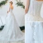 Chic Haute Basse Été Ivoire Plage Robe De Mariée 2019 Princesse Bretelles Spaghetti Perlage Paillettes Appliques En Dentelle Fleur Sans Manches Dos Nu Train De Balayage