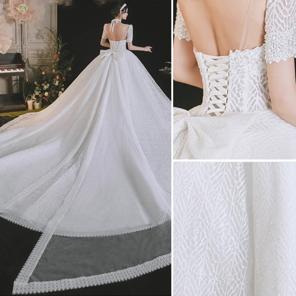 Simple Haut de Gamme Blanche Glitter Robe De Mariée 2021 Robe Boule Encolure Dégagée Manches Courtes Dos Nu Noeud Royal Train Mariage