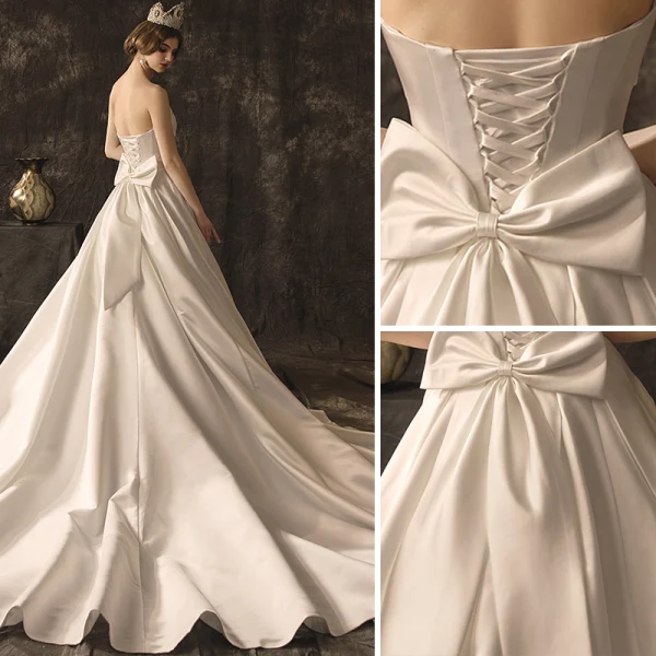 Sjarmerende Elfenben Brudekjoler 2019 Prinsesse Strapless Uten Ermer Ryggløse Sløyfe Chapel Train