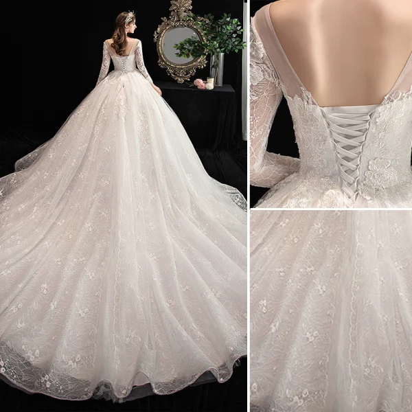 Charmant Ivoire Robe De Mariée 2020 Princesse V-Cou Perlage En Dentelle Fleur 3/4 Manches Dos Nu Cathedral Train