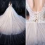 Haut de Gamme Ivoire Robe De Mariée 2020 Robe Boule Encolure Dégagée Perlage En Dentelle Fleur Sans Manches Dos Nu Royal Train