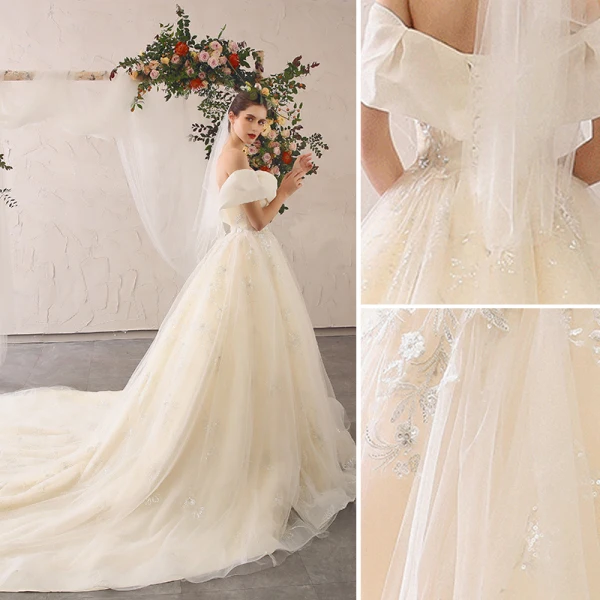 Élégant Champagne Robe De Mariée 2020 Princesse De l'épaule Noeud En Dentelle Fleur Appliques Manches Courtes Dos Nu Cathedral Train