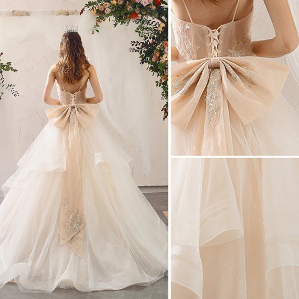 Charmant Champagne Robe De Mariée 2020 Princesse Bretelles Spaghetti Perlage Paillettes En Dentelle Fleur Sans Manches Dos Nu Noeud Volants en Cascade Tribunal Train