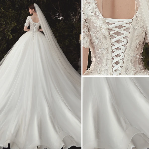Elegant Ivory Wedding Dresses 2020 Ball Gown Deep V-Neck Pearl Lace Flower Appliques Short Sleeve Backless Cathedral Train