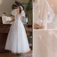 Élégant Ivoire Robe De Mariée 2021 Princesse Encolure Dégagée Perle En Dentelle Fleur Manches Courtes Dos Nu Longue Mariage