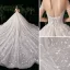Haut de Gamme Ivoire Robe De Mariée 2020 Robe Boule Encolure Dégagée Perlage Faux Diamant En Dentelle Fleur Manches Longues Dos Nu Royal Train