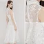 Abordable Ivoire de retour Robe De Graduation 2020 Princesse Col Haut Étoile En Dentelle Sans Manches Thé Longueur Robe De Ceremonie