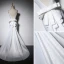 Elegante Ivory / Creme Abendkleider 2018 Mermaid Schleife Spaghettiträger Rückenfreies Ärmellos Sweep / Pinsel Zug Festliche Kleider