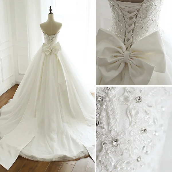 Moderne / Mode Blanche Robe De Mariée 2018 Robe Boule Perlage Cristal Faux Diamant Paillettes Noeud Bustier Dos Nu Sans Manches Tribunal Train Mariage