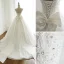 Moderne / Mode Blanche Robe De Mariée 2018 Robe Boule Perlage Cristal Faux Diamant Paillettes Noeud Bustier Dos Nu Sans Manches Tribunal Train Mariage