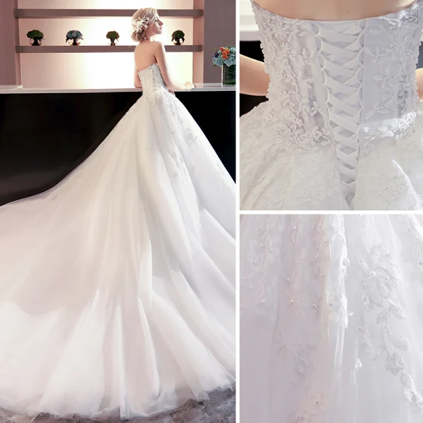 Sjarmerende Elfenben Brudekjoler 2018 Ballkjole Appliques Beading Perle Paljetter Knapper Kjæreste Ryggløse Uten Ermer Royal Train Bryllup