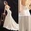 Schlicht Ivory / Creme Brautkleider 2018 Mermaid Perlenstickerei Stoffgürtel Spaghettiträger Rückenfreies Ärmellos Hof-Schleppe Hochzeit