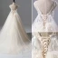 Romantic A-Line / Princess Champagne Tulle Wedding Dresses 2017 Appliques Lace Flower Backless Court Train Sleeveless