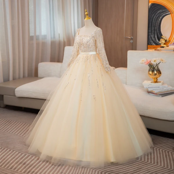 Bling Bling Champagne Perlage Paillettes Robe De Bal 2024 Robe Boule Encolure Carrée Manches Longues Dos Nu Noeud Longue Promo Robe De Ceremonie