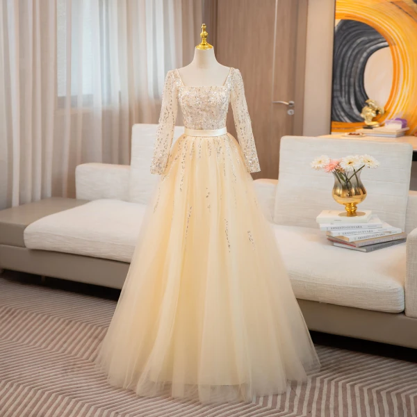 Bling Bling Champagne Perlage Paillettes Robe De Bal 2024 Robe Boule Encolure Carrée Manches Longues Dos Nu Noeud Longue Promo Robe De Ceremonie