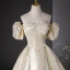 Élégant Doré Robe De Bal 2024 Robe Boule De l'épaule Gonflée Manches Courtes Dos Nu Longue Promo Robe De Ceremonie