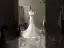 Charmant Ivory / Creme Meerjungfrau Brautkleider / Hochzeitskleider 2021 V-Ausschnitt Ärmellos Rückenfreies Spitze Blumen Hof-Schleppe Hochzeit