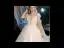 Illusion Ivoire Transparentes La Mariée Robe De Mariée 2020 Princesse Encolure Dégagée Manches Courtes Dos Nu Glitter Tulle Appliques Fleur Perlage Cathedral Train Volants