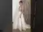 Charmant Ivory / Creme Strand Sommer Brautkleider / Hochzeitskleider 2020 A Linie Spaghettiträger V-Ausschnitt Ärmellos Rückenfreies Perlenstickerei Kapelle-Schleppe Rüschen