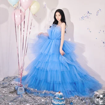 Charmant Bleu Volants En Cascade Robe De Fête 2022 Robe Boule Bretelles Spaghetti Sans Manches Dos Nu Longue Soirée Robe De Ceremonie