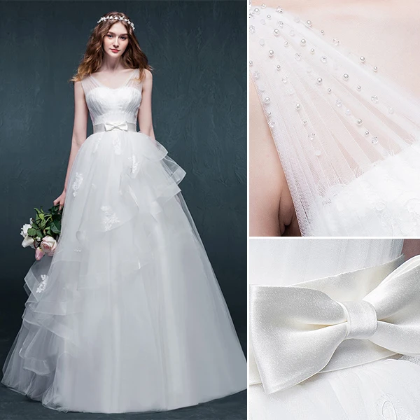 Épaules Un-ligne Perlage Perles Noeud Volants Guillotine Organza Robe De Mariée