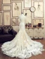 Gorgeous Mermaid Spaghetti Straps Handmade Flowers Backless Champagne Lace Wedding Dresses