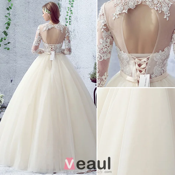 2016 Gorgeous Ball Gown Lace Neckline Pierced Design Backless Champagne Tulle Wedding Dress With Bow Sash
