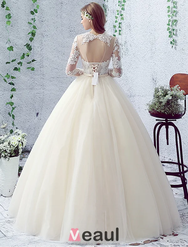 2016 Gorgeous Ball Gown Lace Neckline Pierced Design Backless Champagne Tulle Wedding Dress With Bow Sash
