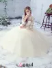2016 Gorgeous Ball Gown Lace Neckline Pierced Design Backless Champagne Tulle Wedding Dress With Bow Sash