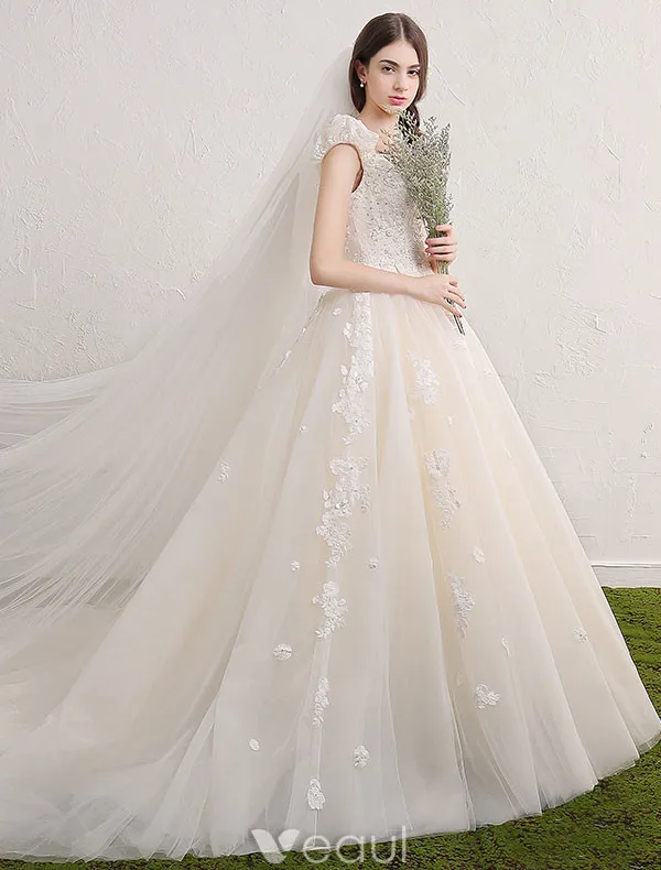 Princess Wedding Dresses 2017 Deep V-neck Applique Lace Flowers Champagne Tulle Bridal Gowns With Long Train