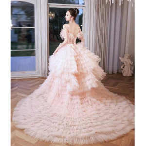 Encantador Rosa Clara Volantes En Cascada Vestidos De Novia 2023 Ball Gown Spaghetti Straps Tassel Sin Mangas Sin Espalda Bowknot Cinturón Chapel Train Boda