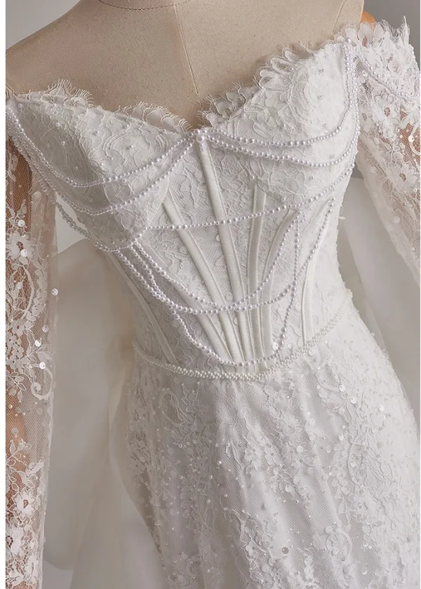 Elegante Schöne Weiß Perle Pailletten Spitze Blumen Applikationen Brautkleider / Hochzeitskleider 2025 Meerjungfrau Off Shoulder Lange Ärmel Rückenfreies Schleife