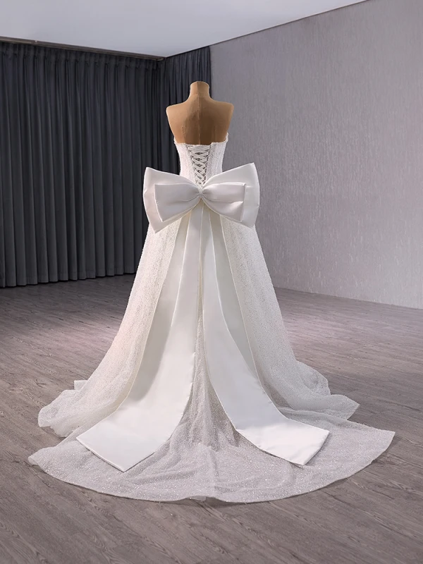 Luxe Blanche Fait main Perlage Perle Paillettes Robe De Mariée 2024 Trompette / Sirène Bustier Sans Manches Dos Nu Noeud Train De Balayage Mariage