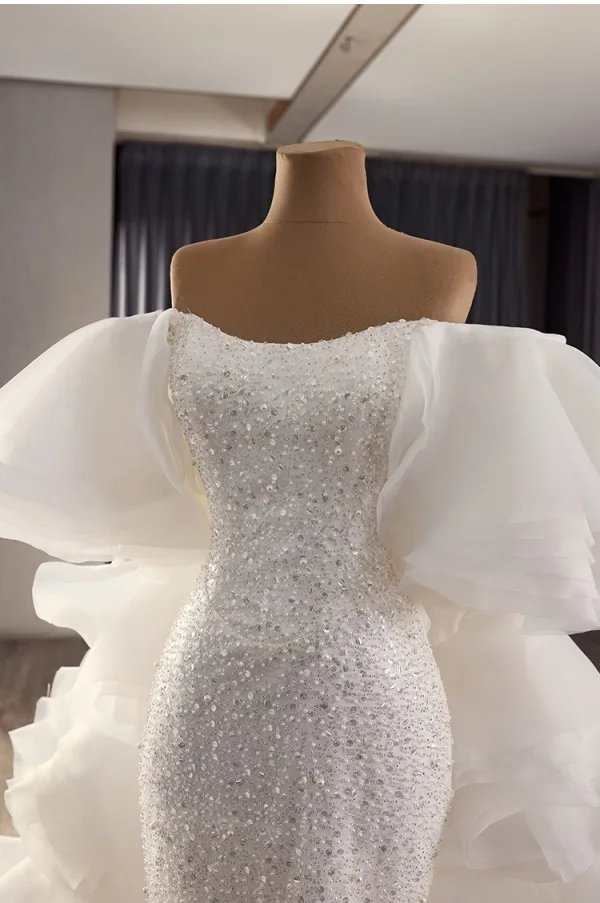 Luxe Blanche Fait main Perlage Perle Paillettes Robe De Mariée 2025 Trompette / Sirène De l'épaule Sans Manches Dos Nu Chapel Train Mariage
