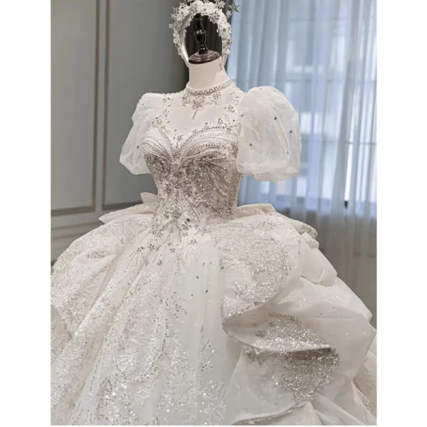 Luxury / Gorgeous Charming Ivory Beading Pearl Rhinestone Star Sequins Wedding Dresses 2022 Ball Gown High Neck Cascading Ruffles Short Sleeve Royal Train